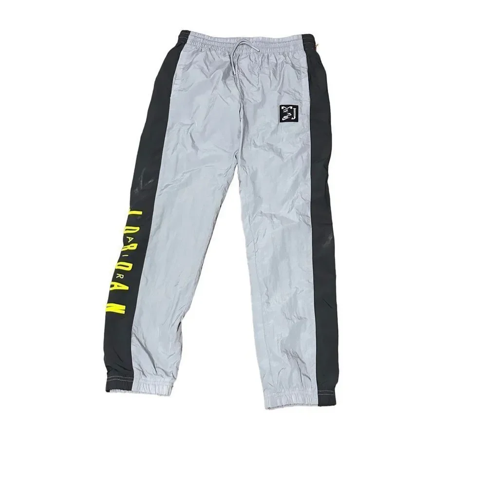 Nike Air Jordan Jumpman Youth Boys Wolf Gray/Volt Windbreaker Pants Size large (